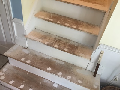 Chesapeake Property Finishes Interior Stairs - Before