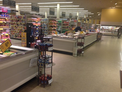 Chesapeake Property Finishes Grocery Store Painting of Coffin Cases
