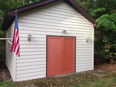 Chesapeake Property Finishes Shed Painted to Match